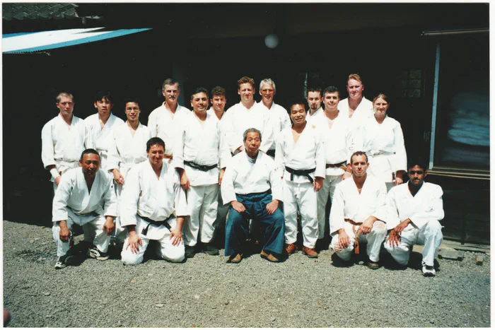 Morihiro Saito Sensei with visiting students at the Iwama dojo.